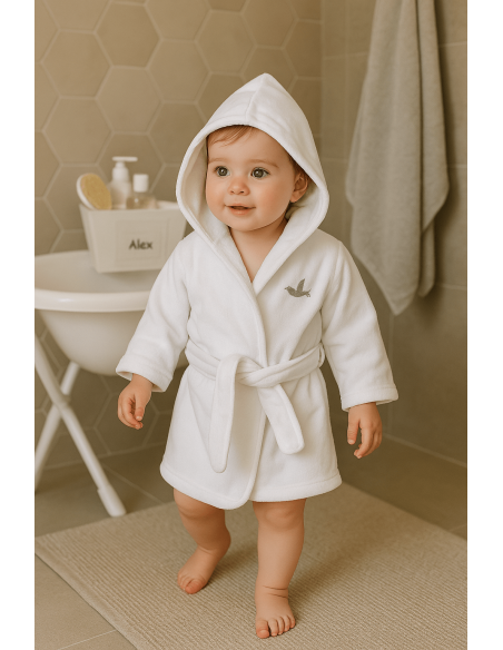 Natural cosmetic products for babies with embroidered bathrobe